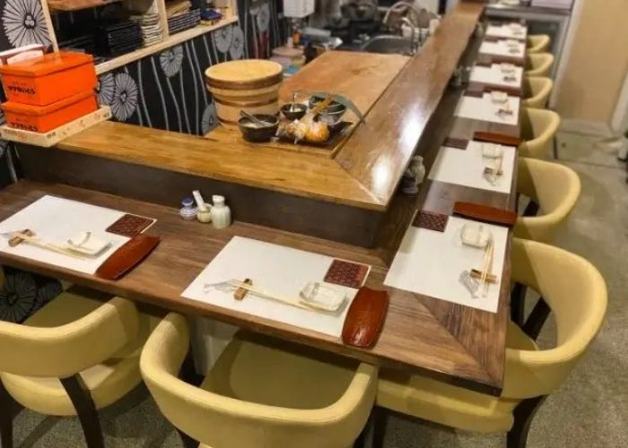 Counter seating at Ginza Saisho, where you can eat omakase sushi course menus.
